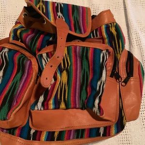 Embroidered leather backpack